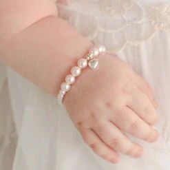 Pink Luster Pearl Bracelet With Silver Heart Charm(Pink Luster Pearl Bracelet With Heart Cross)